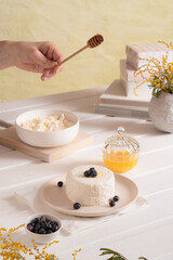 Curd with honey. Breakfast in bright colors