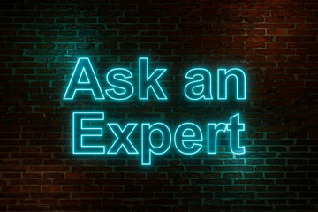 Ask an expert. Brick wall at night, illuminated neon text "Ask an Expert" in blue letters.  Advice, decisions, expertise, knowledge, helping hand, skilled occupation, service.