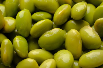 Closeup of peeled edamame. Edamame or mao dou in Chinese, has the Latin name Glycine mas is a tropical plant that belongs to the legume sub-family