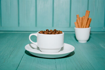 A cup of aromatic fresh natural coffee beans