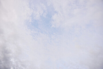 Blue sky and tiny white clouds for background.