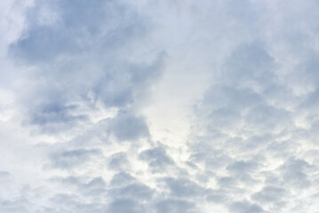 Blue sky and tiny white clouds for background.