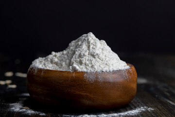 Wheat flour from a wooden bowl