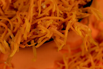 ripe carrots cut into thin slices and pickled in vinegar and spices