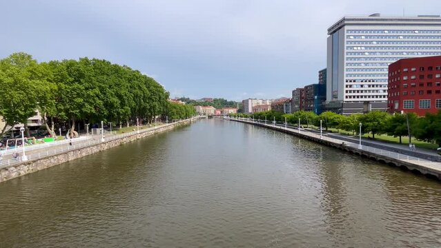 Bilbao downtown with a Nevion River area in Bilbao, Spain during the sunny day