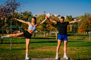 Happy sporty couple exercising together