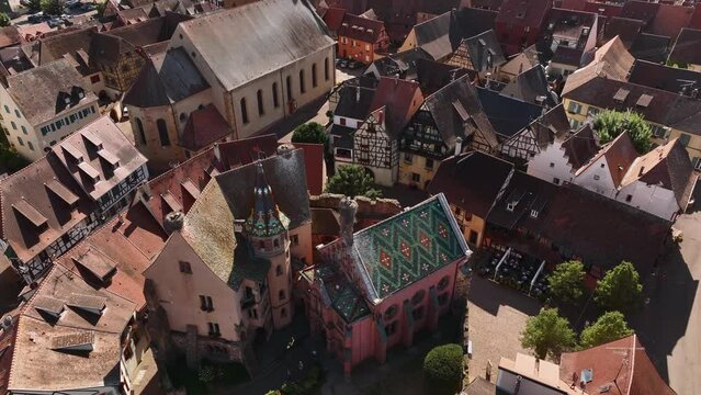 Aerial Drone Shot of Eguisheim village in the Alsace province, France. Picturesque village in a Sunny Summer Day