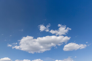 Naklejka na ściany i meble sky with clouds on a sunny spring day