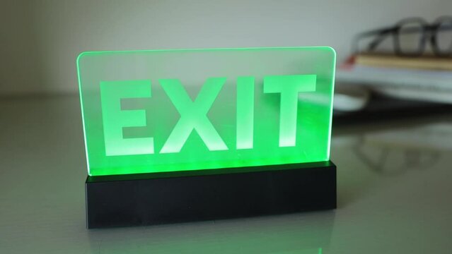 the word exit, the symbol way out of a difficult situation, the concept of finding an idea or coming up with a life hack