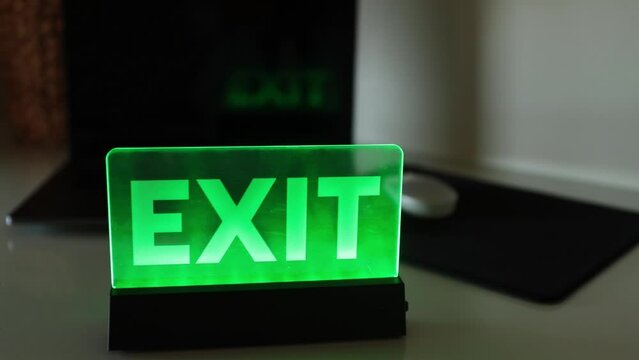 the word exit, the symbol way out of a difficult situation, the concept of finding an idea or coming up with a life hack