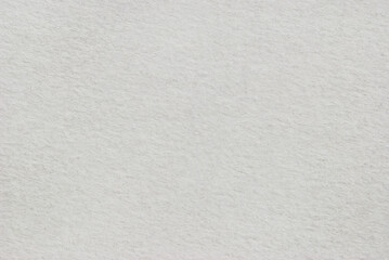 Watercolor paper texture as background, macro image of a white rouge paper pattern

