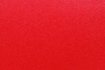 Red color glossy craft paper texture as background
