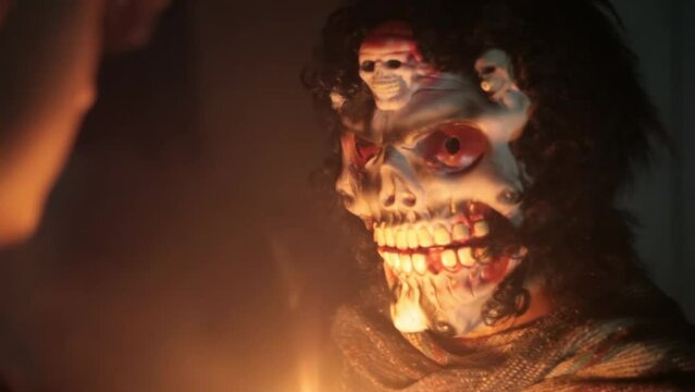 Cinematic shot of a man and a scary person with a mask on face to face, close-up shot with smoke.HD footage 24 FPS. 