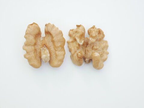 Wallnuts brain, isolated on white background. Raw wallnut kernels