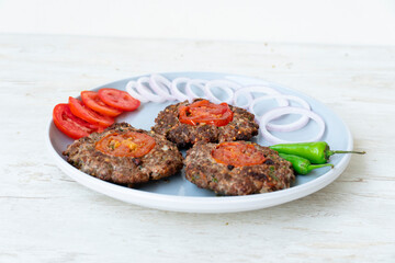 chapli kabab dish isolated on background top view pakistani food