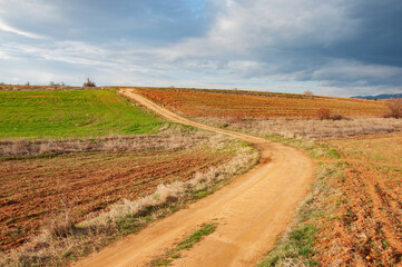 Rural landscape, dirt road, sunset