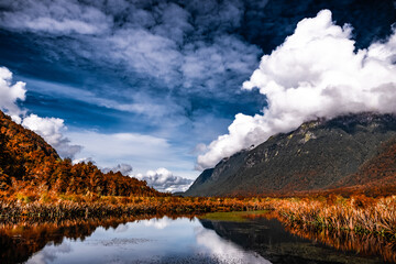 Clouds of a different appearance near Milford Sound, New Zealand. Milford Sound nature in November 2022.
