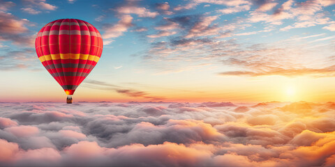 Obraz premium A hot air balloon floating through clouds during sunrise 