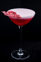 Strawberry daiquiri made with white rum, strawberry syrup and lime juice.