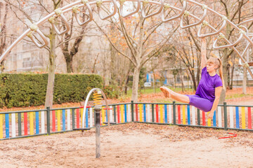 Calisthenics park fitness healthy wellbeing lifestyle in outdoor work out. mid hispanic woman.