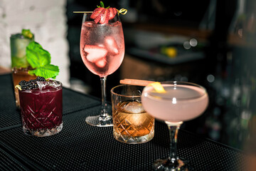 Different cocktails on a bar