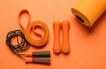 colored fitness background with fitness accessories