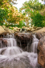 Small rock waterfall in a park