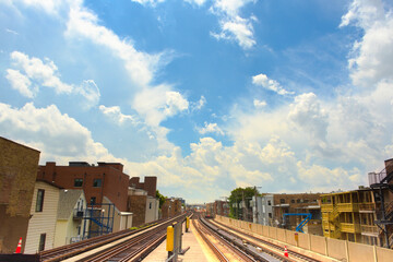 Dwellings built in close proximity to train tracks capture the grittiness of modern city life