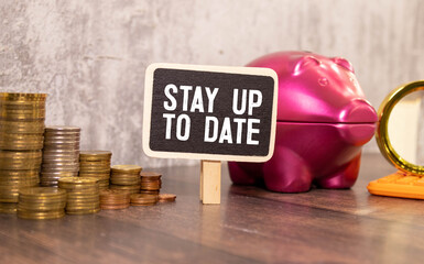 money and a black sign that says Stay up to Date