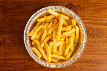French fries in a takeout container