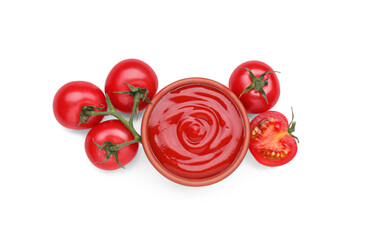 Bowl with tasty ketchup and fresh tomatoes isolated on white, top view