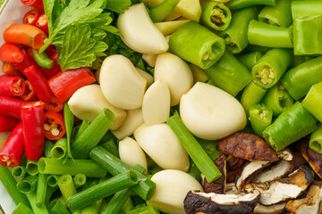 Variety of chopped side dishes on a monochrome background