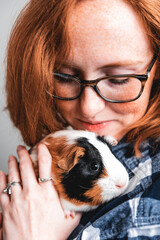 woman with a guinea pig