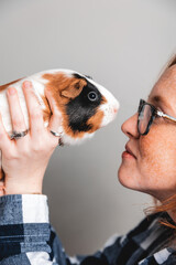 girl and a guinea pig