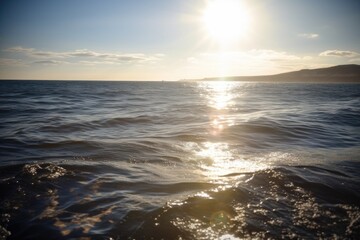 Naklejka premium sparkling sea with the sun shining down on it, casting a warm and inviting light, created with generative ai
