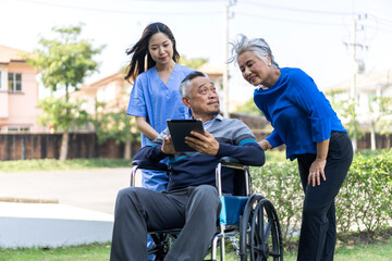 Portrait of smiling caring asian nurse service help support discussing and consulting taking care with senior elderly asian man and woman couple at home visit.senior retirement home care concept