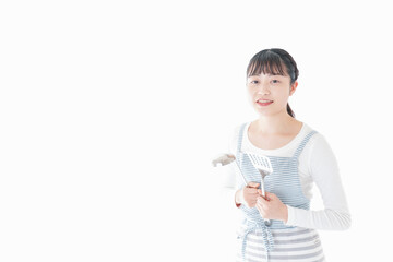 クッキングをする若い女性