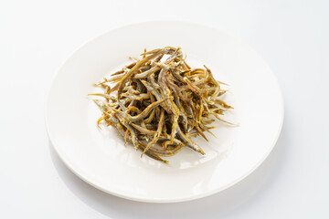 Salted anchovies on a monochrome background