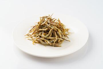 Salted anchovies on a monochrome background