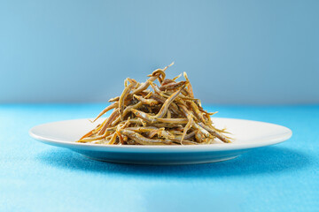 Salted anchovies on a monochrome background