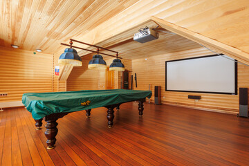 billiard table in a large room