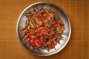 Spicy small whitebait with Northeast local special dish on monochrome background