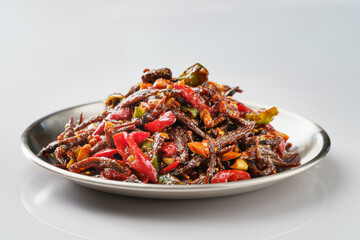 Spicy small whitebait with Northeast local special dish on monochrome background