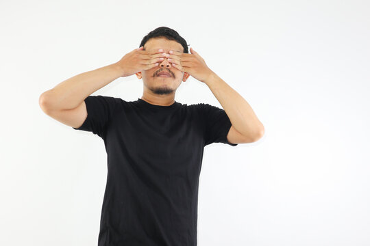 Adult Asian man screaming desperate while close his eyes with hand. mental health concepts.