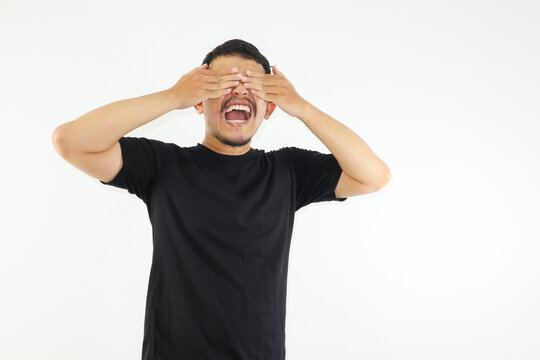 Adult Asian man screaming desperate while close his eyes with hand. mental health concepts.
