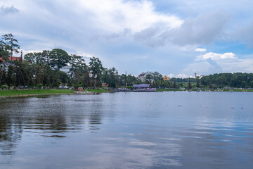 Fototapeta na wymiar Beautiful morning by Xuan Huong Lake, Da Lat city center, Lam Dong province, Vietnam
