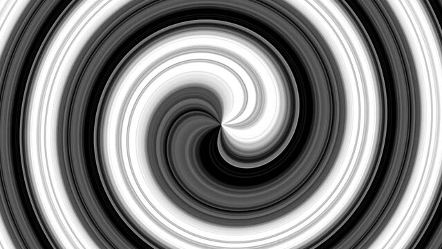 A mesmerizing black and white spiral spins hypnotically. The vibrant hues of red, orange, yellow, green, blue, and purple blend seamlessly as they twist inward, creating an entrancing optical illusion