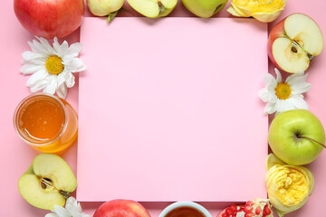 Composition with blank card, ripe fruits, flowers and honey on pink background, closeup. Rosh hashanah (Jewish New Year) celebration