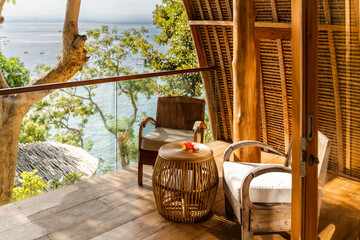 Interior detail shots of eco resort balcony overlooking the ocean