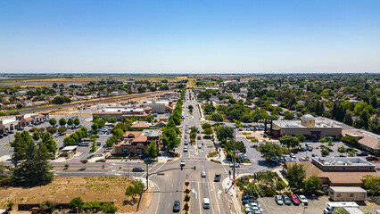 Stunning aerial views capture vibrant Downtown Oakley, California, showcasing its architectural...
